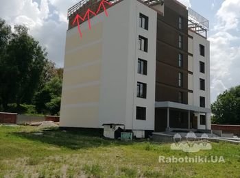 Утепление фасада,много этажного дома