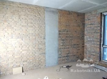 Закладка щелей в кирпичной кладке.