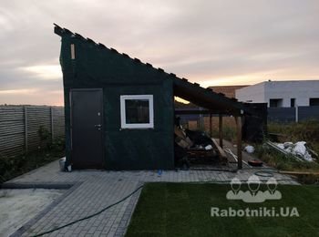 Обшивка сарая сайдингом и кровля