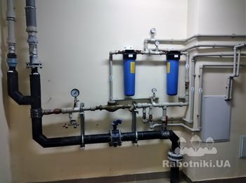 Система підвищення тиску води в будівлі
