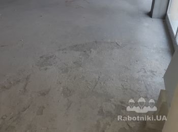 Выравнивание стяжки равнителем.