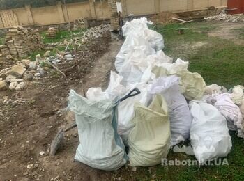 Завантажити буд сміття на камаз