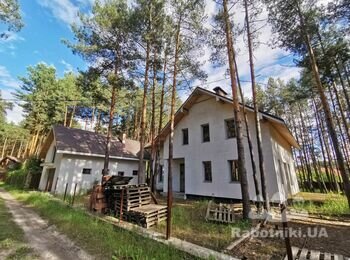 Паркан 22 п. м., стовпи лицьова цегла, прольоти дерев'яна дошка
