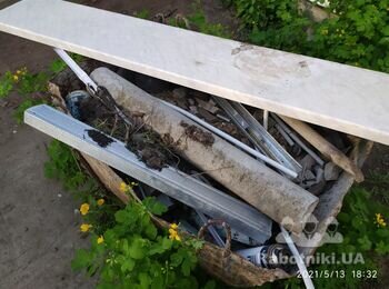 Вывоз строительного мусора насыпью Газон