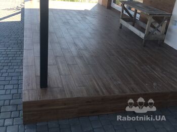 Снять старую и положить новую плитку на пол 20 кВ.м