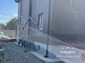 Необходимо доложить клинкерную плитку на фасаде дома