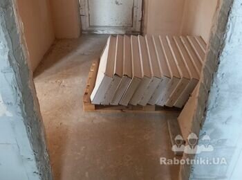 Укладання плитки санвузол + вітальня (підлога).Загальна пл - 54 кв. м