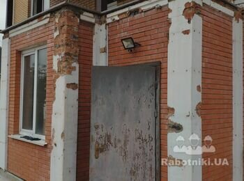 Штукатурка фасада дома по маякам