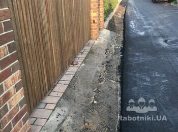 Укладання гранітної (колотої ) тротуарної плитки, з бетонуванням 0,1