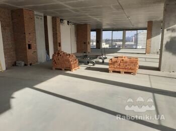 Кирпичная кладка перегородок между квартирных в кирпич