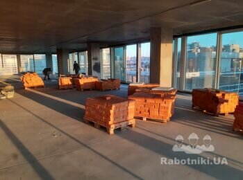 Кирпичная кладка перегородок между квартирных в кирпич