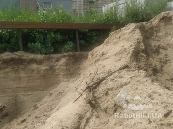 Деревянная заборка шпунтовой ограды