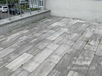 Демонтировать и уложить около 30 кв.м. тротуарной плитки