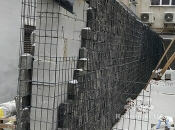 Изготовление декоративной подпорной стенки из шлакоблока с облицовкой