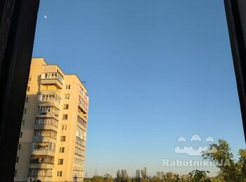Установка деревянных окон на балконе