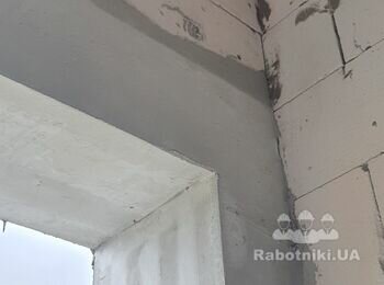 Штукатурка і шпаклівка гаражного проєму, вирівнювання відкосів вікна