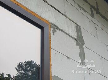 Штукатурка і шпаклівка гаражного проєму, вирівнювання відкосів вікна