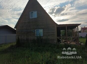 Покраска дома из блокхауса