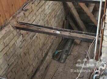 Бетонная перемычка между балконом и подвалом