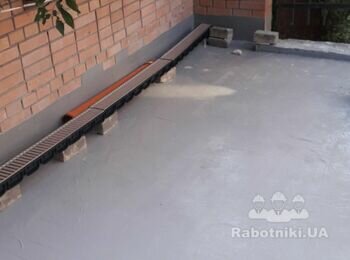 Улаштування бруківки і водовідливу