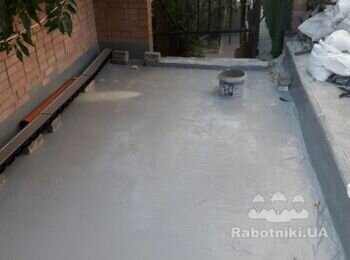 Улаштування бруківки і водовідливу