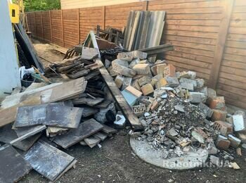 Вивезення будівельного сміття з завантаженням